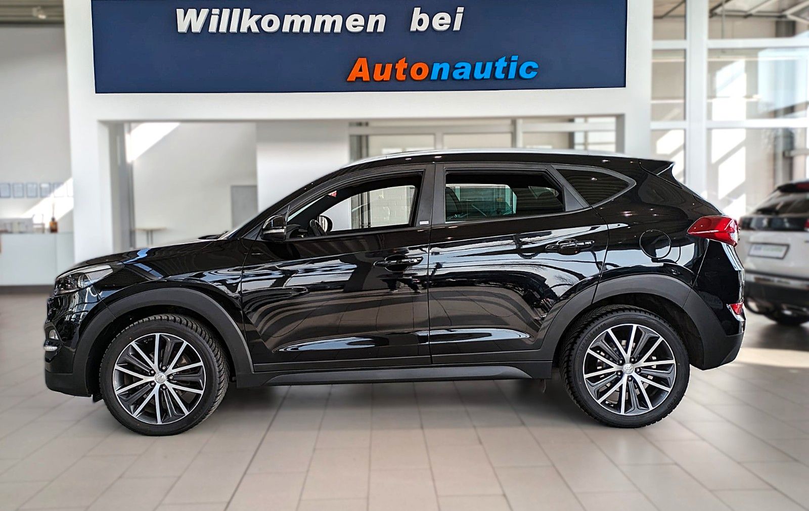 Fahrzeugabbildung Hyundai TUCSON 1.6i DTC PASSION SITZHZ ANDROID NAVI CAM