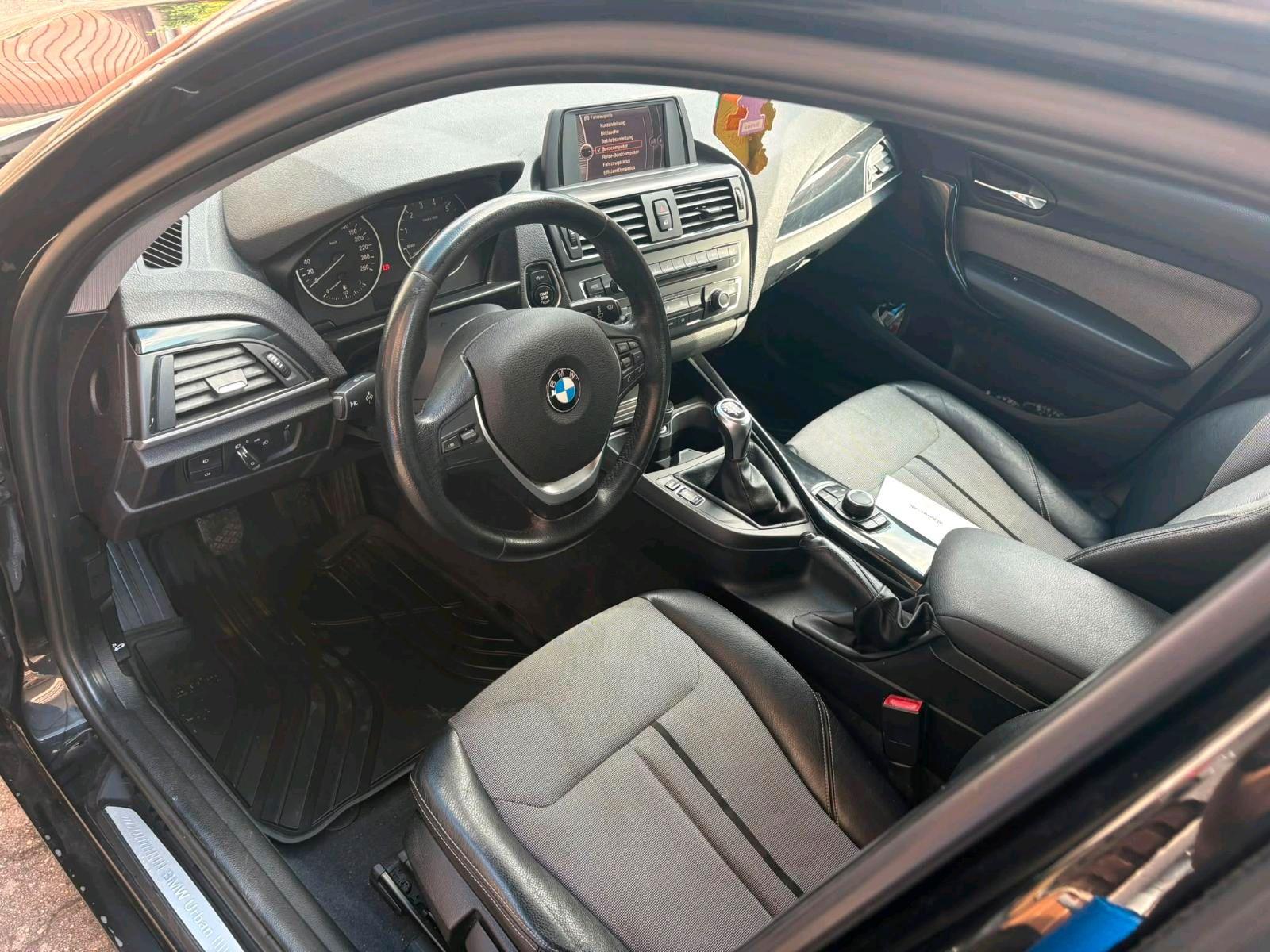 BMW 116 2011 — interior