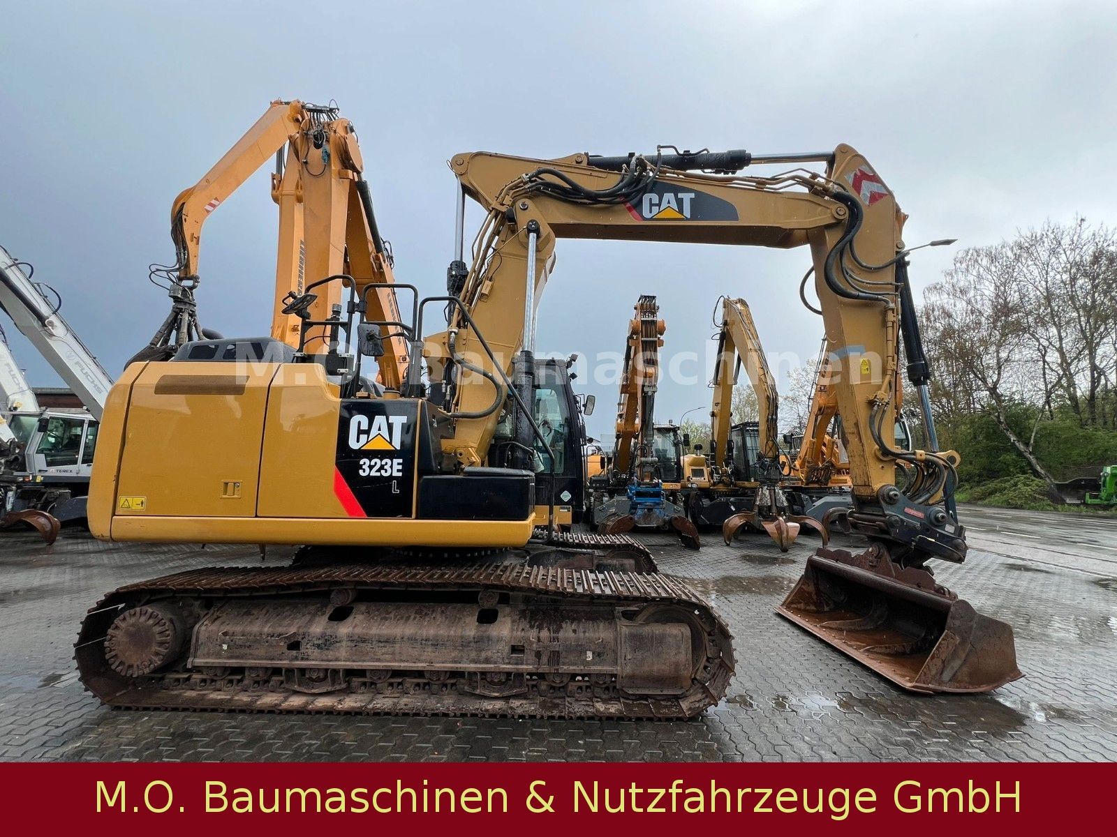 Fahrzeugabbildung CAT 323 EL /Trimble 3 D  VSA / Oilquick OQ 70/55