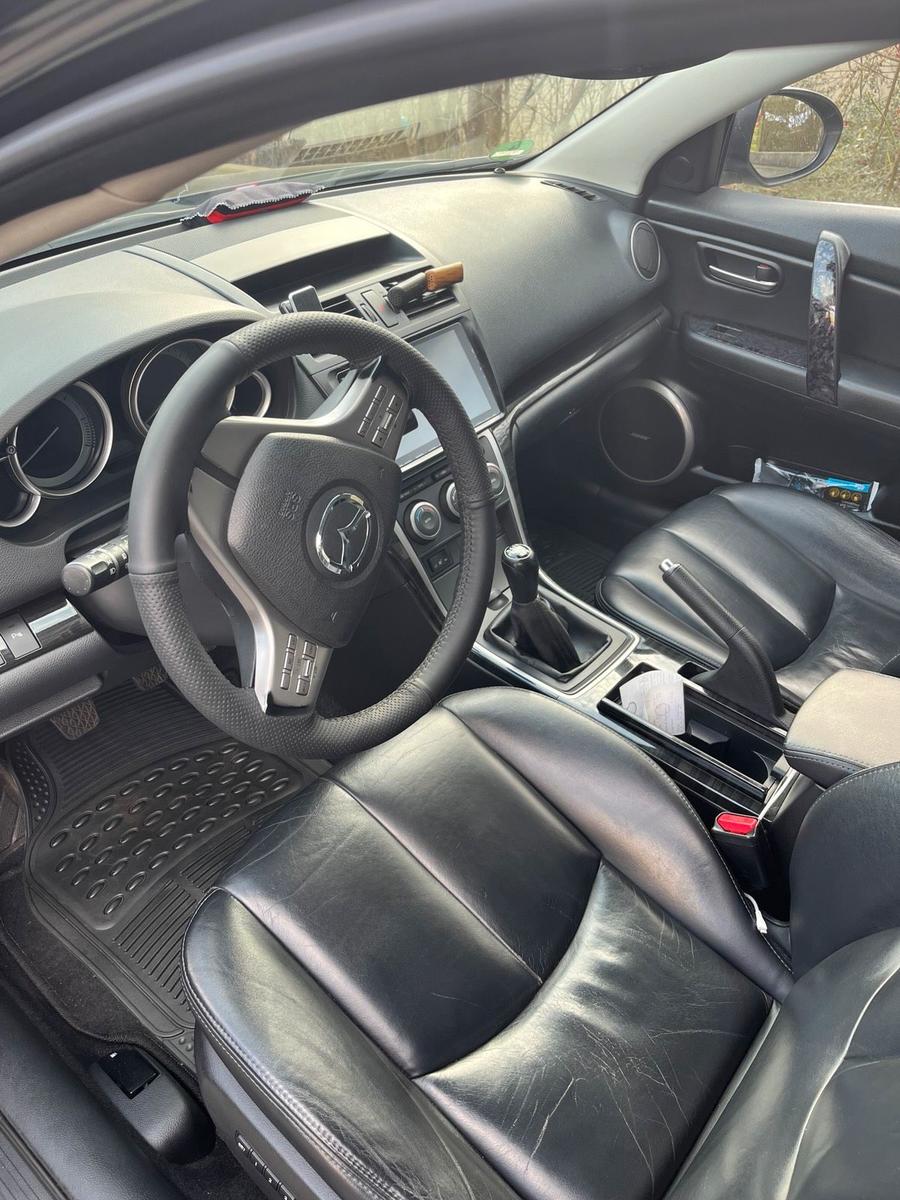 Mazda 2 2008 — photo 13