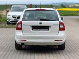 Skoda Octavia 2.0 TDI Combi *1 HAND *NAVI *XENON - Skoda Octavia aus 2012 mit Diesel-Antrieb: Kombi