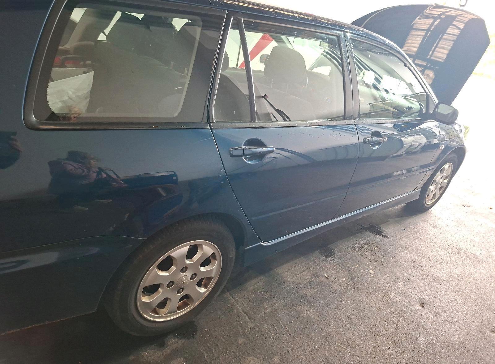 Mitsubishi Lancer 2005 — photo 11