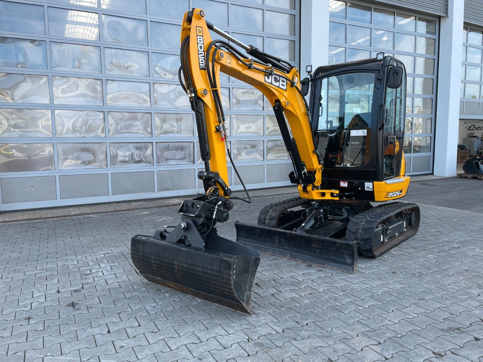 Fahrzeugabbildung JCB 8029 CT / 151h / 2023 / Inkl. Löffelpaket - mit KI generiert/bearbeitet