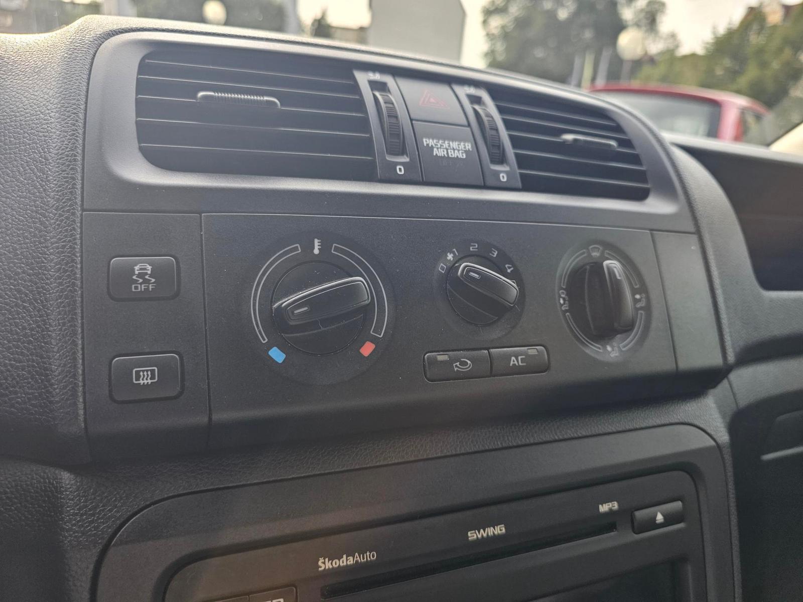 Skoda Fabia 2012 — photo 16