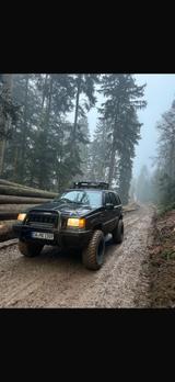 Jeep Grand Cherokee 4.0i TÜV 4/27 rustikal lauter höh - gebrauchte Jeep Grand Cherokee aus dem Jahr 1993