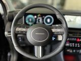 Hyundai TUCSON PRIME HEV ALLRAD + ASSIST.-PAKET+GLASDACH - Hyundai TUCSON: Gl