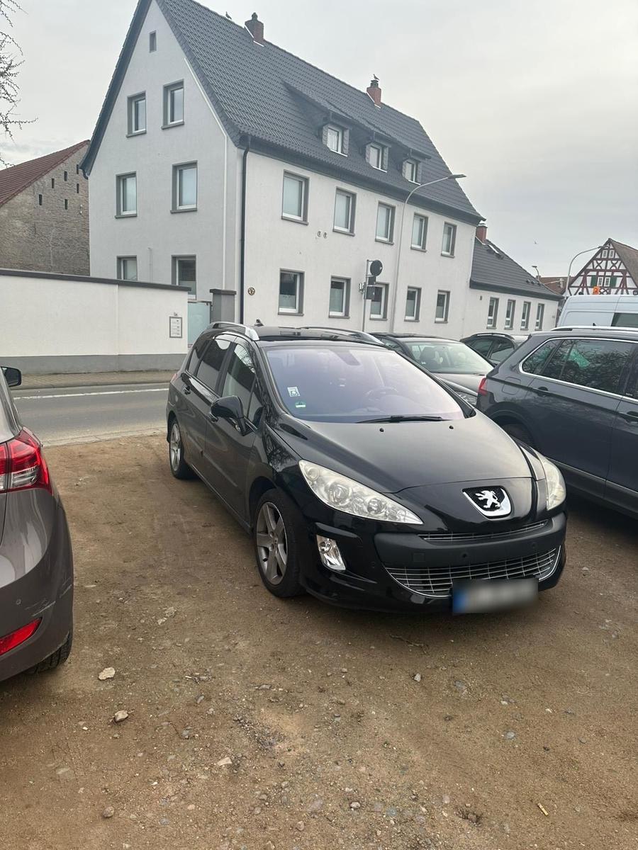 Peugeot 308 2008 — rear view