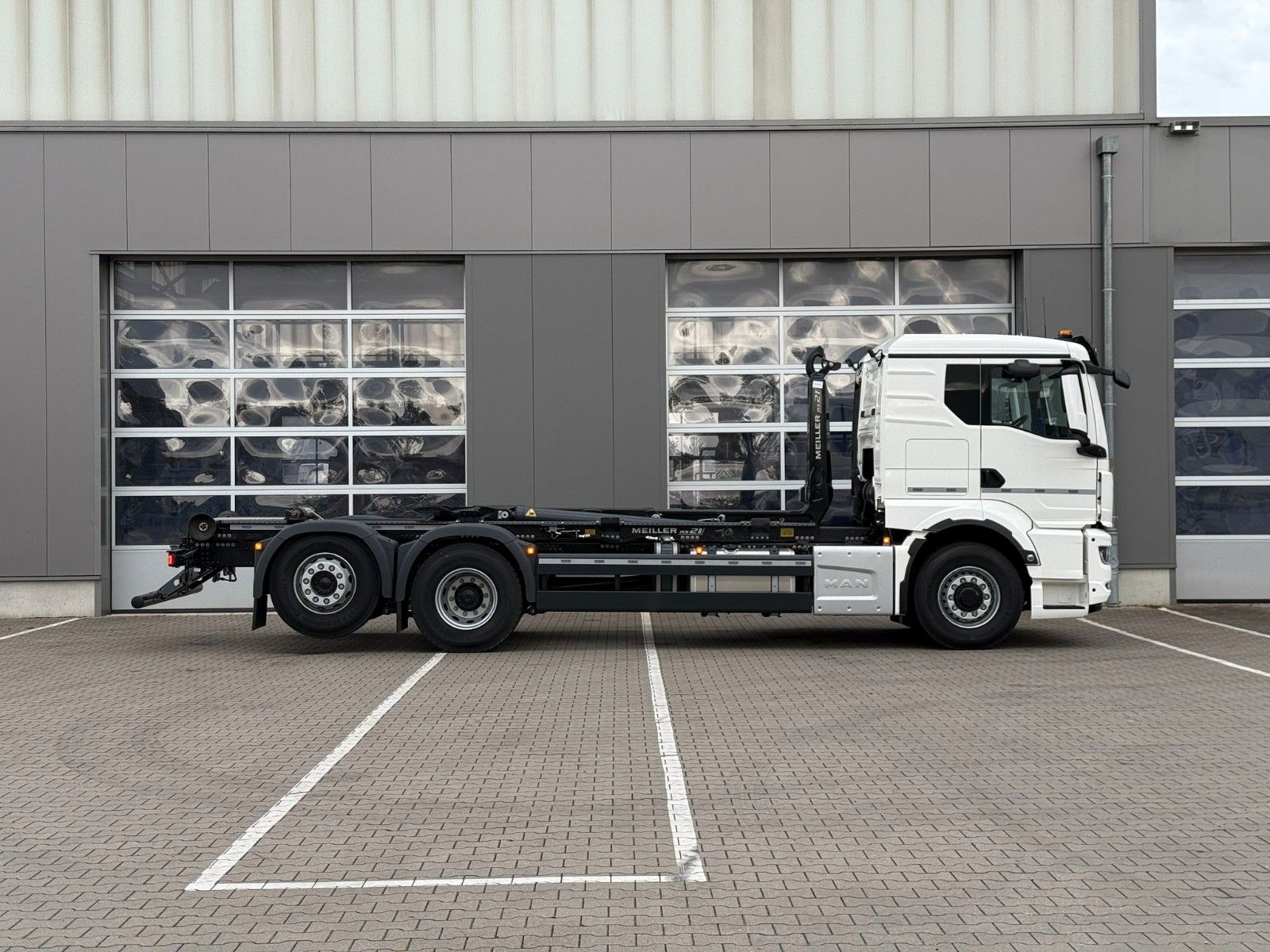 Fahrzeugabbildung MAN TGS 26.520 6x4H-2 BL MEILLER RS 21.70 Funkfernb.
