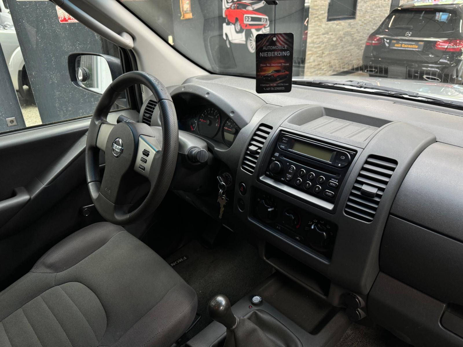 Nissan Frontier 2005 — photo 31