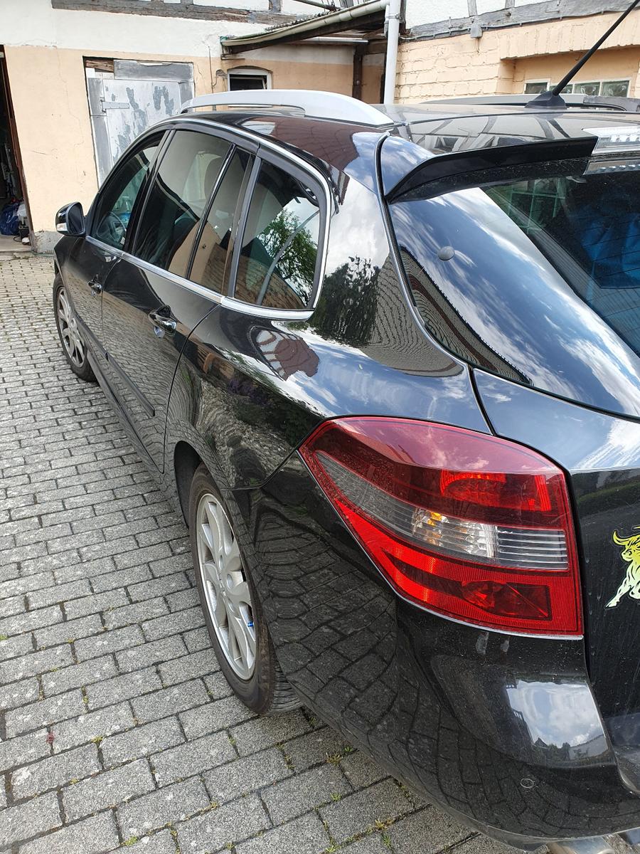 Renault Laguna 2010 — rear view