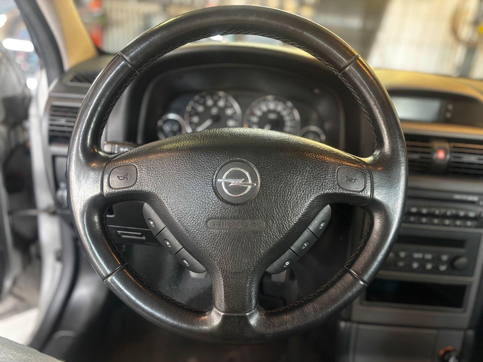 Opel Astra 2004 — photo 10