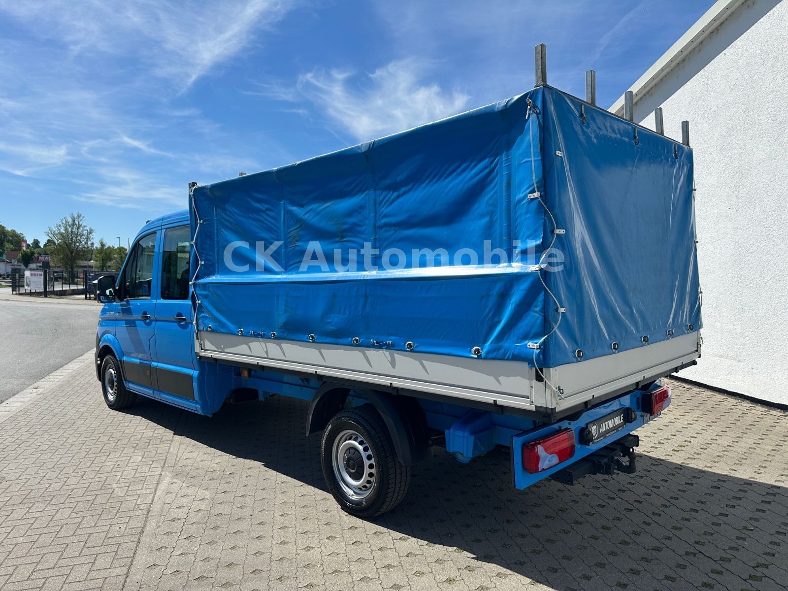 Fahrzeugabbildung MAN TGE 3.180 DoKa Pritsche/Plane 4X4/6 Sitze/AHK