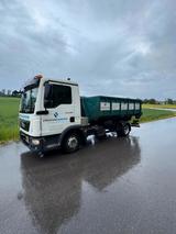 MAN Abrollkipper incl. Container