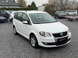 Volkswagen Touran Freestyle 7Sitze/PDC/Navi/AHK/Garantie - Volkswagen Touran Freestyle mit Benzin-Antrieb