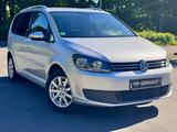 Volkswagen Touran Comfortline 1.4*ALU*PDC*AHK*7 SITZER+ - gebrauchte Kleinbusse in Paderborn