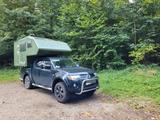 Mitsubishi L200 mit Ormocar Wohnkabine - gebrauchte Mitsubishi L200 aus dem Jahr 2009