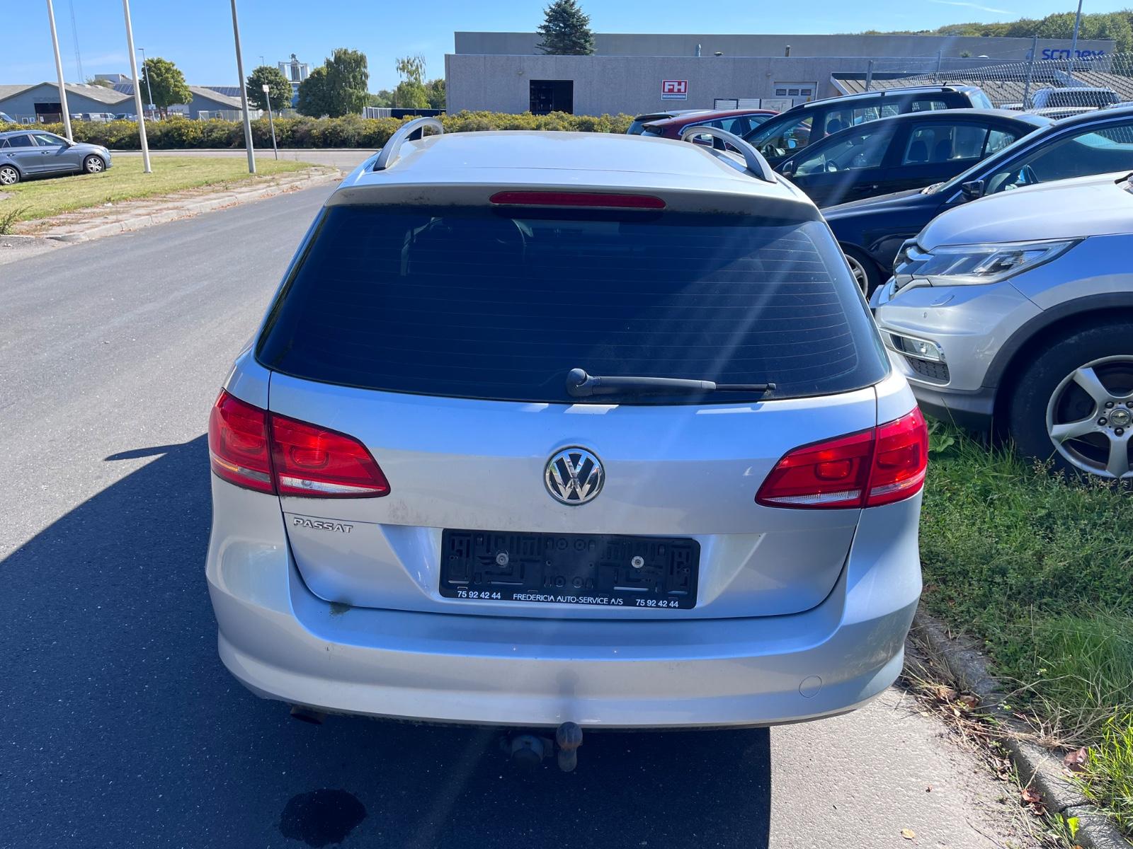Volkswagen Passat 2011 — engine 1.390 cm³, 122 HP (90kW)