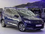 Volkswagen Touran Active Start-Stopp-DSG-1.Hand (7-Sitzer) - Volkswagen Touran: Schiebetuer
