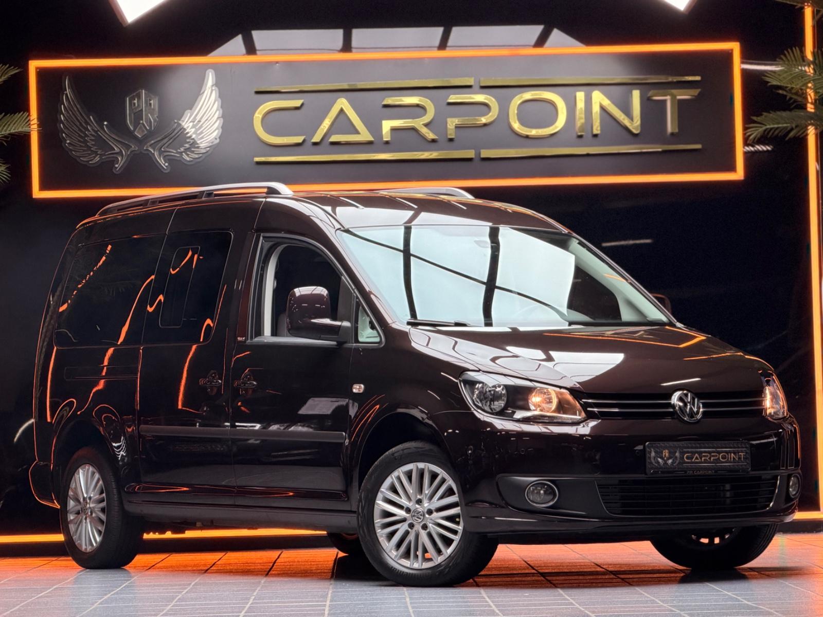 Volkswagen Caddy Maxi Kombi / Navi /7-Sitzer/Rollstuhl-Kran
