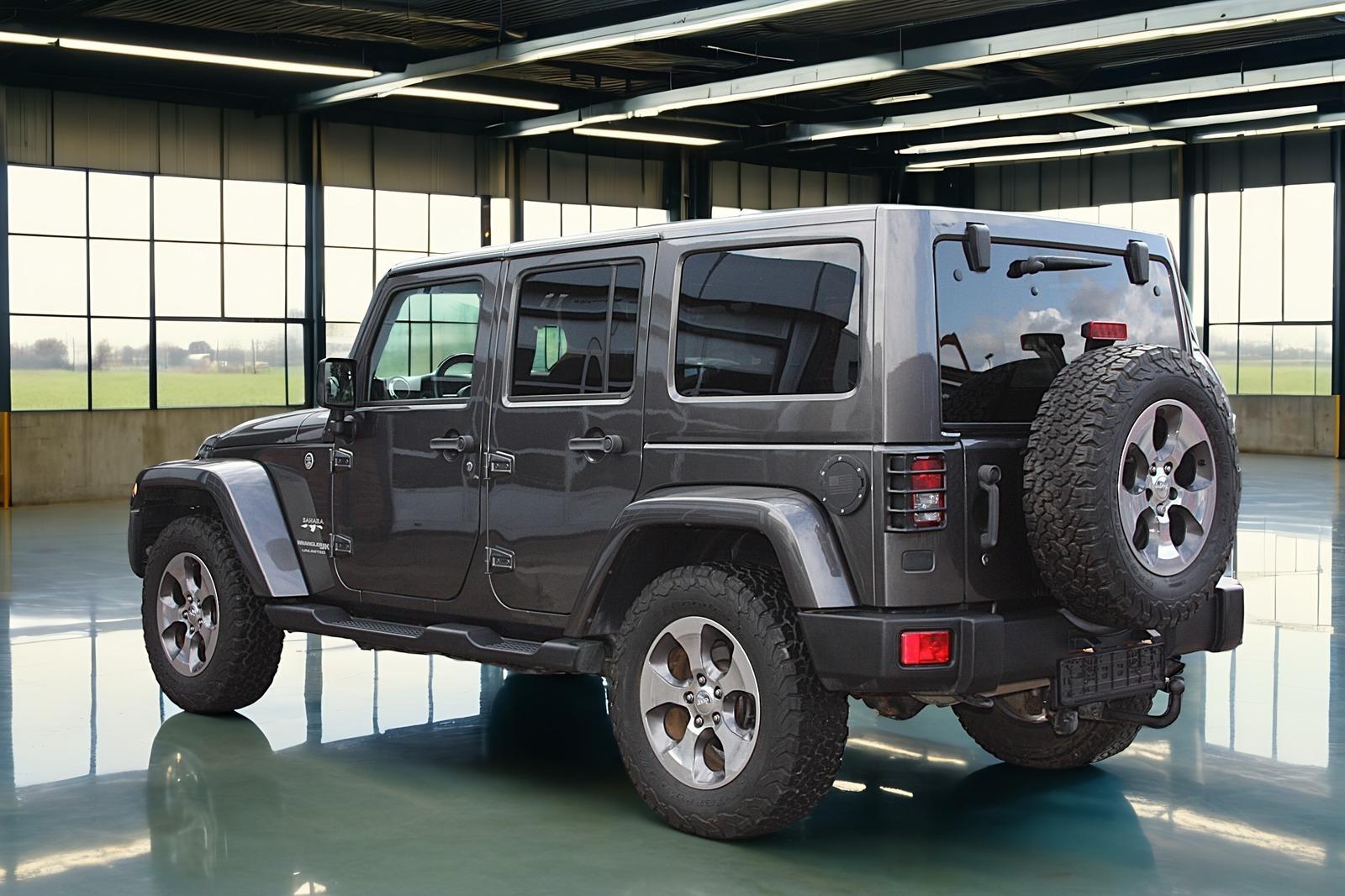 JEEP WRANGLER 2.8 SAHARA AUTO. GPS / CUIR / ATTELAGE / LED | 200 ch | 4X4 | ATTELAGE FIXE | PANORAMA | SELLERIE CUIR