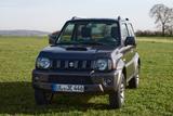 Suzuki Jimny  - graue Suzuki Jimny