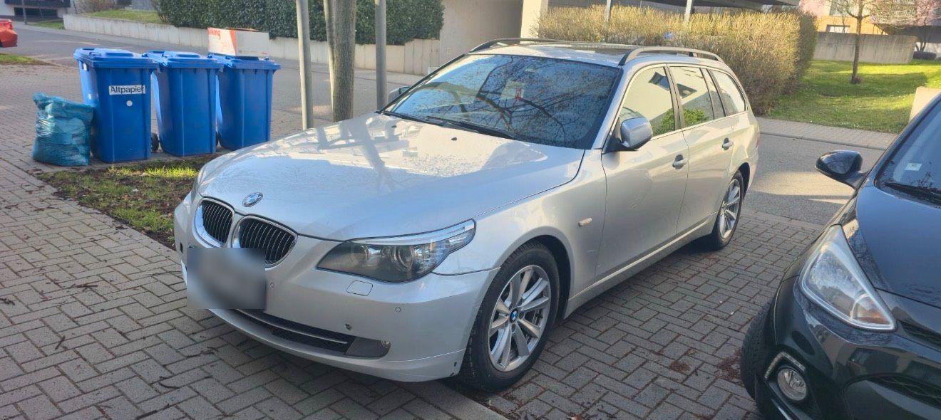 BMW 530 2010 — rear view