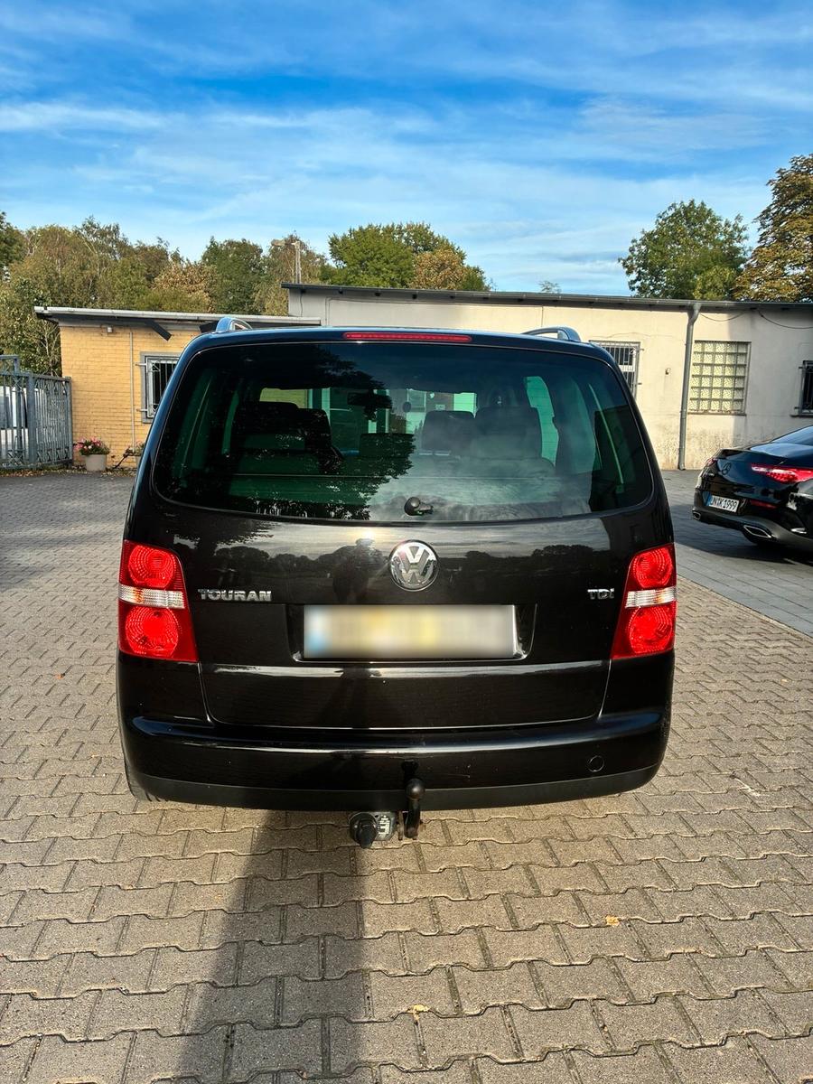 Volkswagen Touran 2005 — engine 105 HP (77kW)