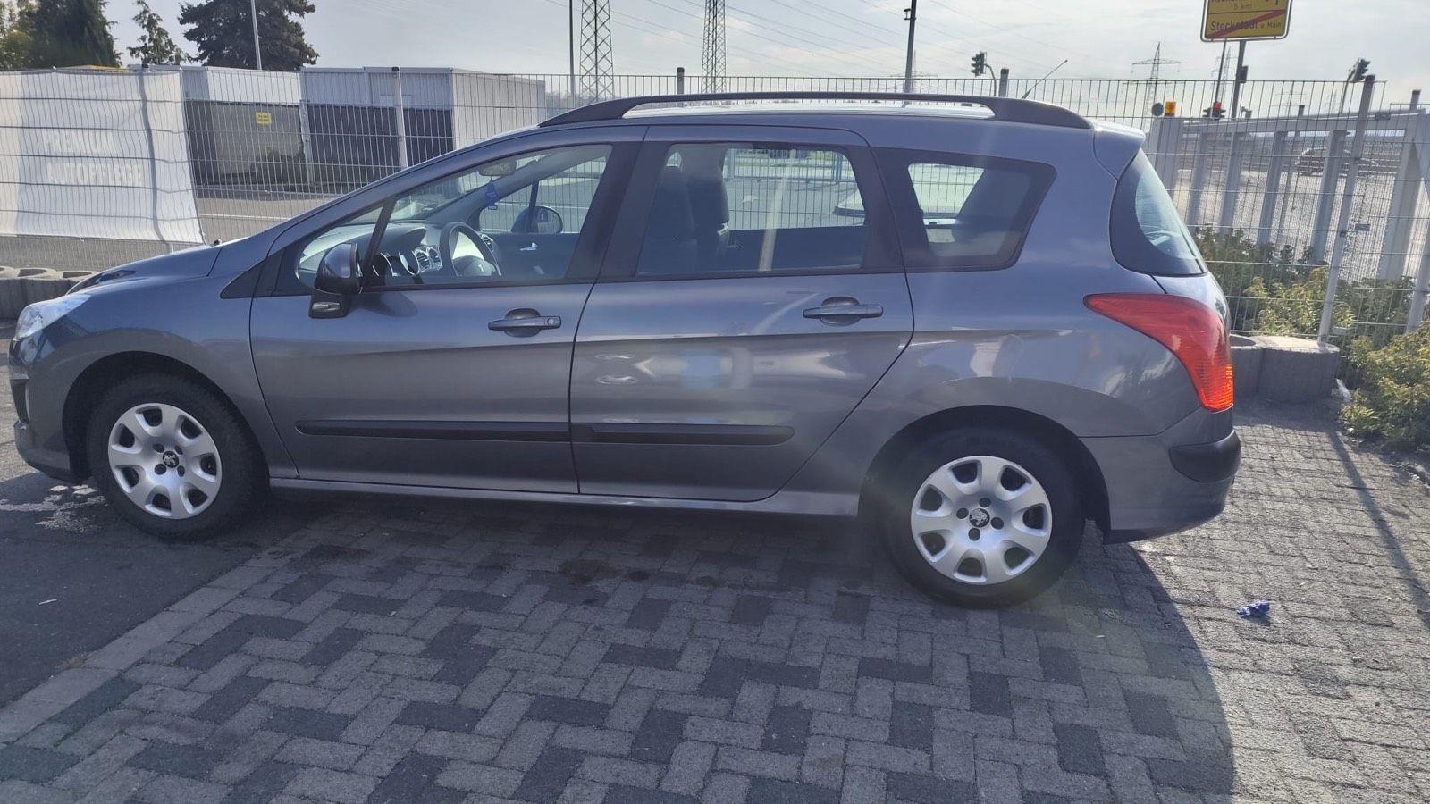 Peugeot 308 2011 — photo 14