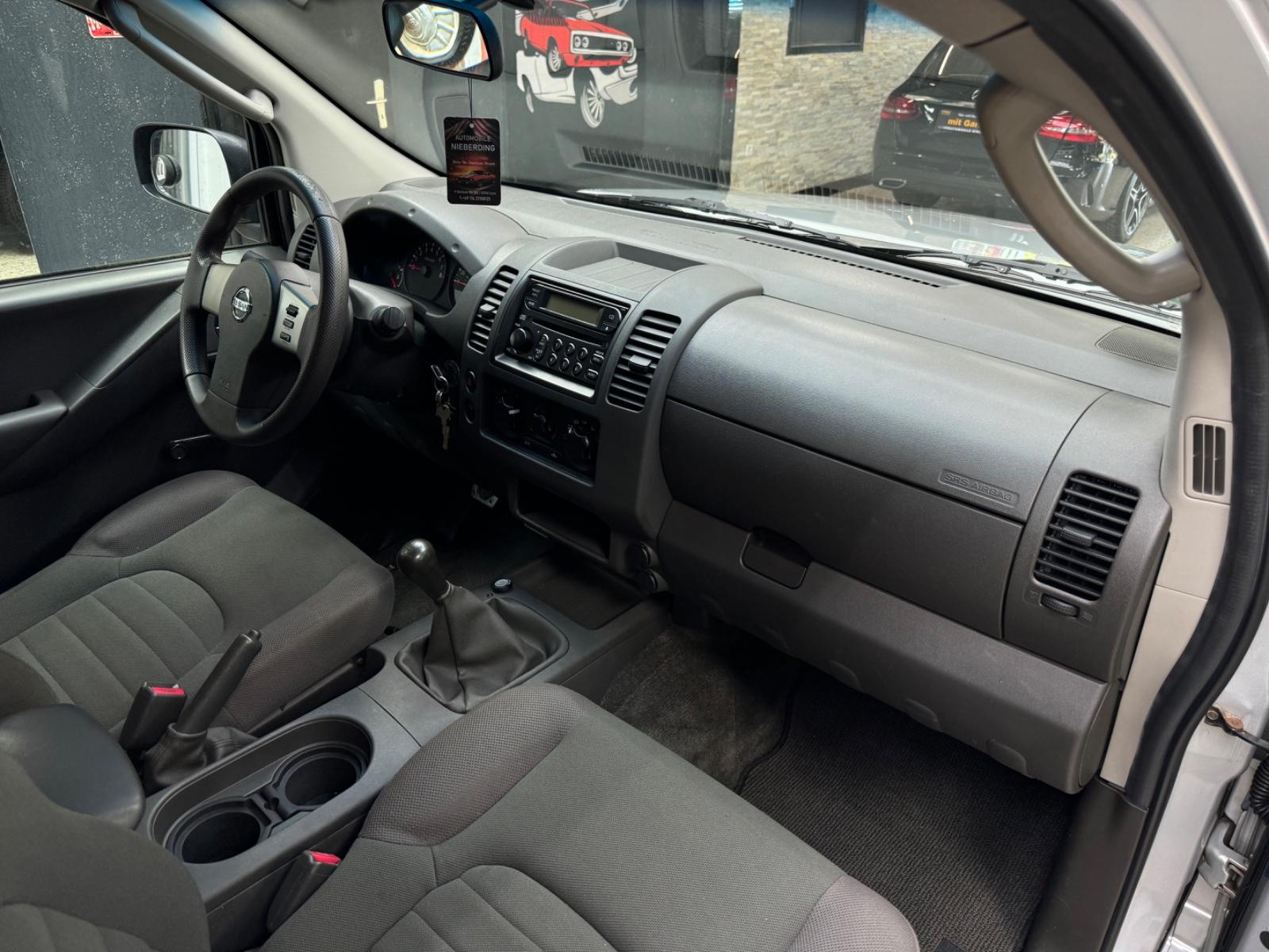 Nissan Frontier 2005 — photo 25