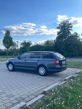 Skoda Octavia 1.2 TSI Ambiente Combi Ambiente - Skoda Octavia aus 2011