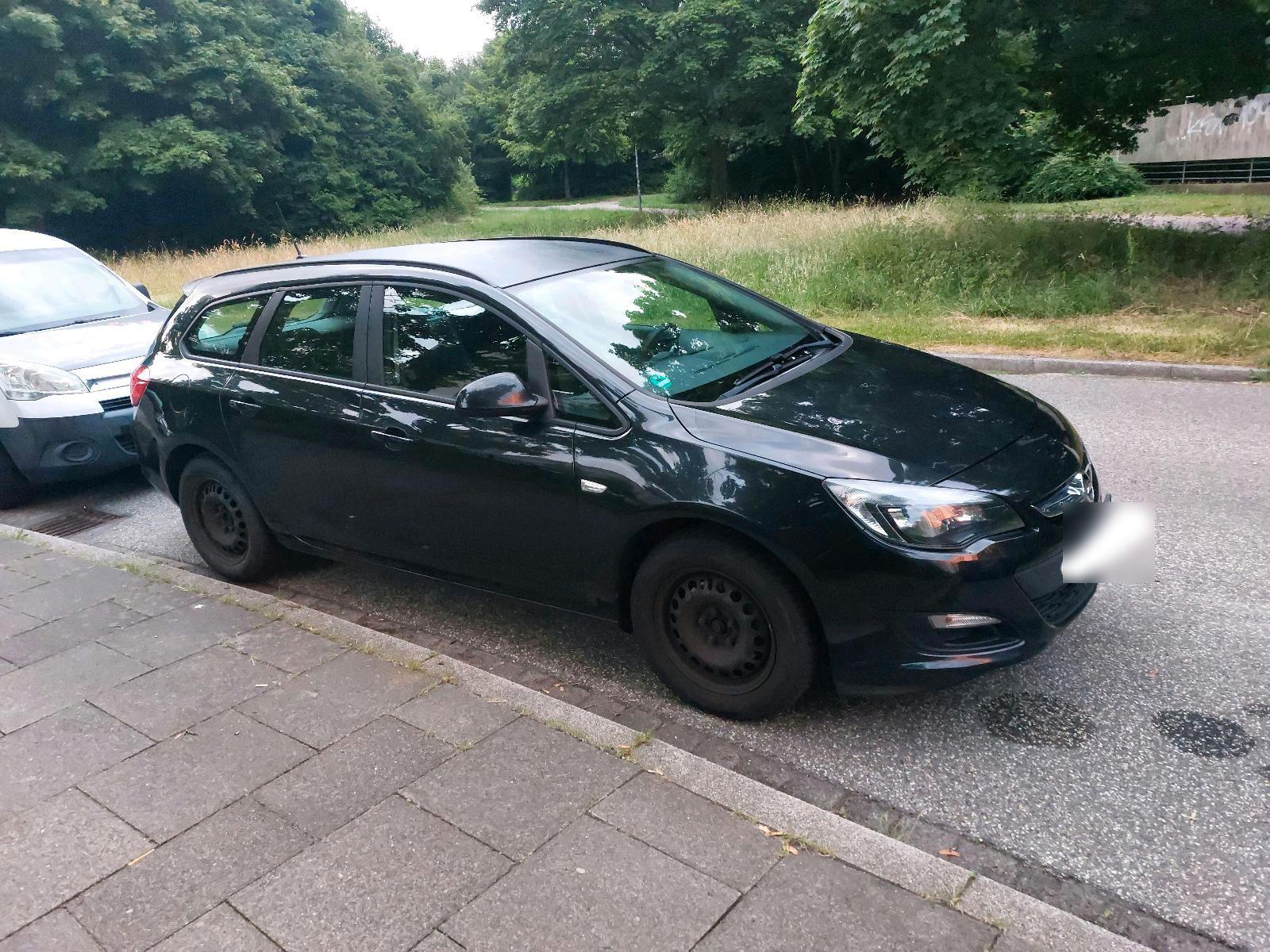 Opel Astra 2014 — rear view