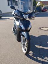 Honda SH Vision mit Koffern und Scheibe - Offers