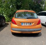 Peugeot orange  - Peugeot 207 in Kassel