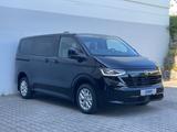 Volkswagen T7 Caravelle Style 2.0 TDI Autom. AHK/Standhzg/P - VW T7 Caravelle mit Schiebetür