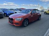 BMW M135 i xDrive Alcantara Schiebedach Advantage Pl - BMW: Orange