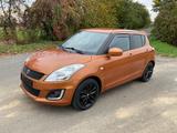 Suzuki Swift 1.2 Comfort AHK, Klima, eFH, Bluetooth - Suzuki Swift mit Benzin-Antrieb: Orange