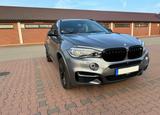 BMW X6 M50d Scheckheftgepflegt bei BMW. In einem top - graue BMW X6 M50