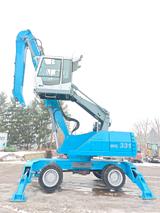 Fuchs MHL 331 D - Fuchs Mobilbagger