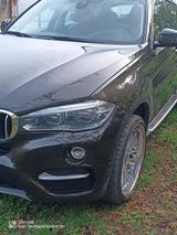 BMW X6 xDrive40d - - mit Diesel-Antrieb: Braun, Sportfahrwerk, Geländewagen