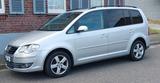 Volkswagen Touran 1.9 TDI DSG DPF Highline Highline - Volkswagen Touran mit Diesel-Antrieb: Kleinbus, 1.9