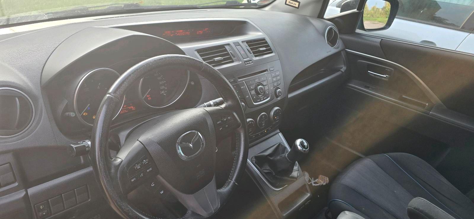 Mazda 2 2011 — photo 8