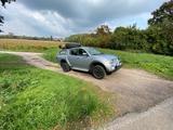 Mitsubishi L200 136PS mit Dachzelt blau 4x4 - gebrauchte Mitsubishi L200 aus dem Jahr 2006
