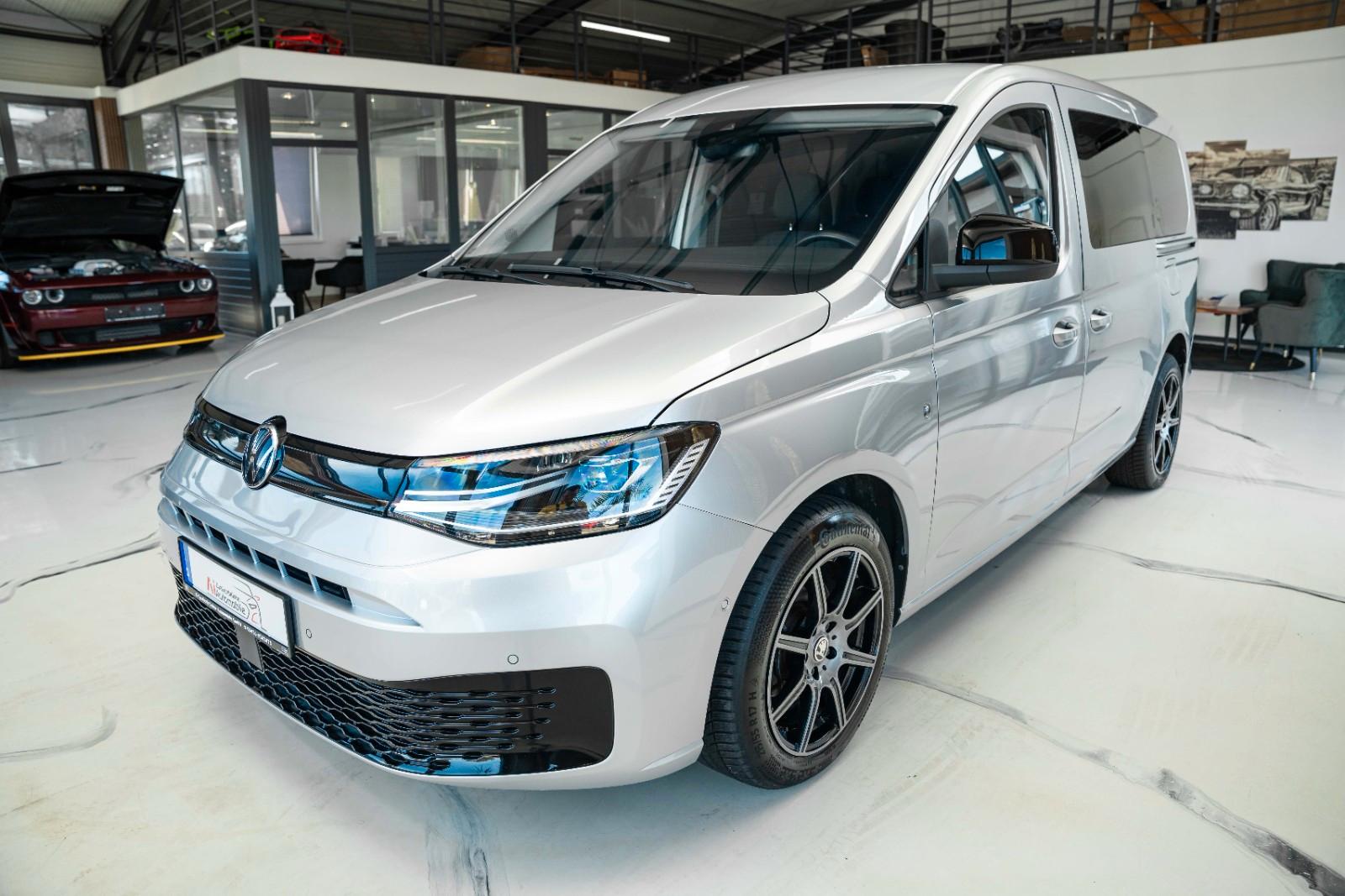 Volkswagen Caddy Maxi 2.0 TDI 7-Sitzer1. Hand | Navi | Lcd