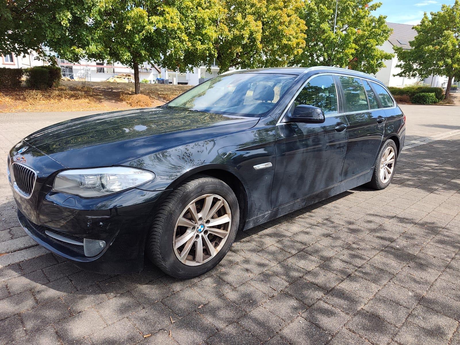 BMW 530 2011 — rear view