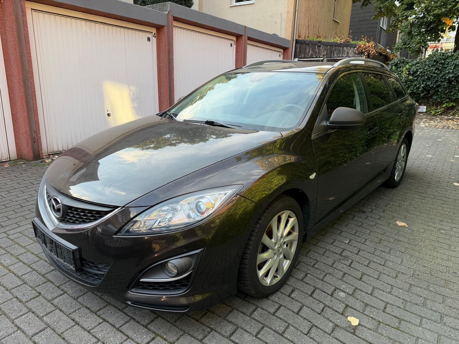 Mazda 2 2011 — вигляд ззаду