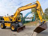 Volvo EW 140 B *FULL HYDR* - BLADE - 10.485h - TILT BU - Volvo Mobilbagger Ew