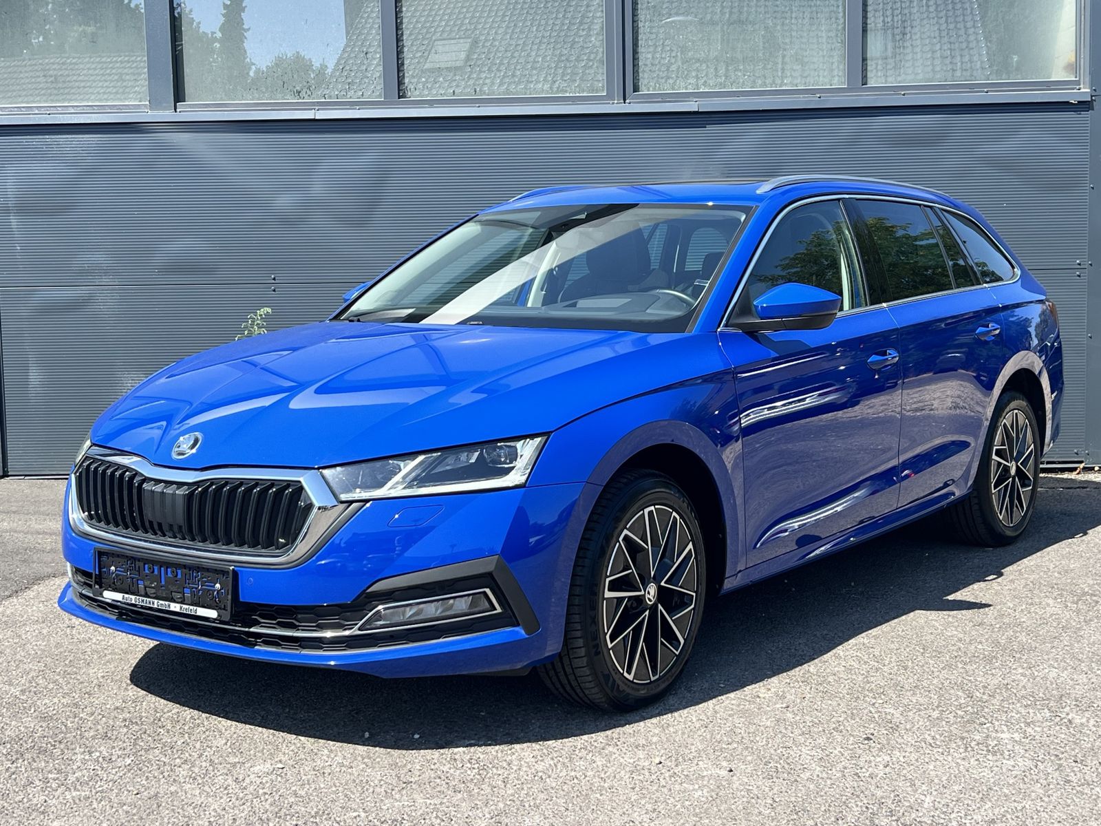 Skoda Octavia Combi 2.0 TDI DSG 4x4 Style ACC PANO foto 2