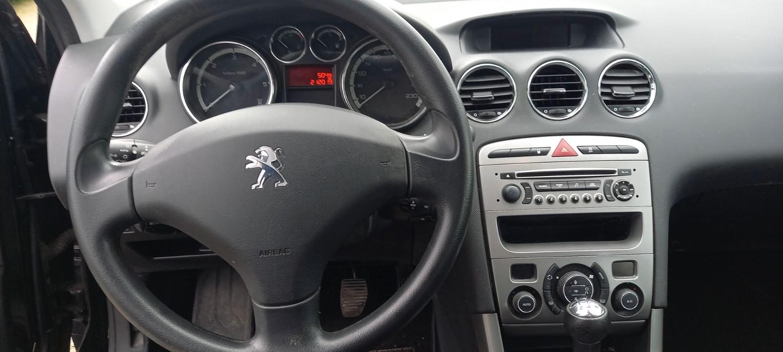 Peugeot 308 2014 — photo 18