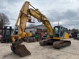 New Holland Kobelco E 215 B - New Holland Schlepper