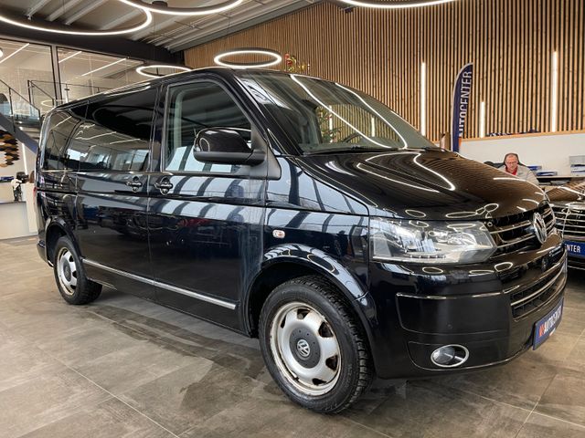 Volkswagen T5  Caravelle Comfortli *9-SITZER*NAVI*SZHZ*AHK*